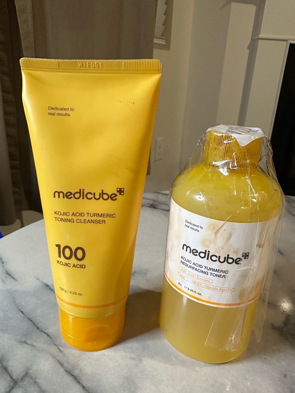 Medicube Kojic Acid Turmeric Toning Cleanser and acid toner.